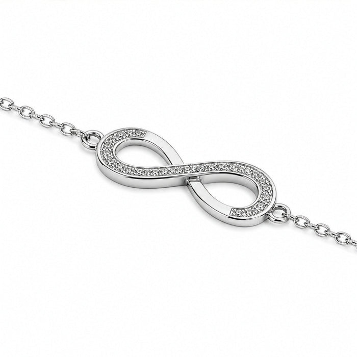 Sterling Silver Rhodium Plated Lab Diamond Infinity Bracelet | 0.15ctw