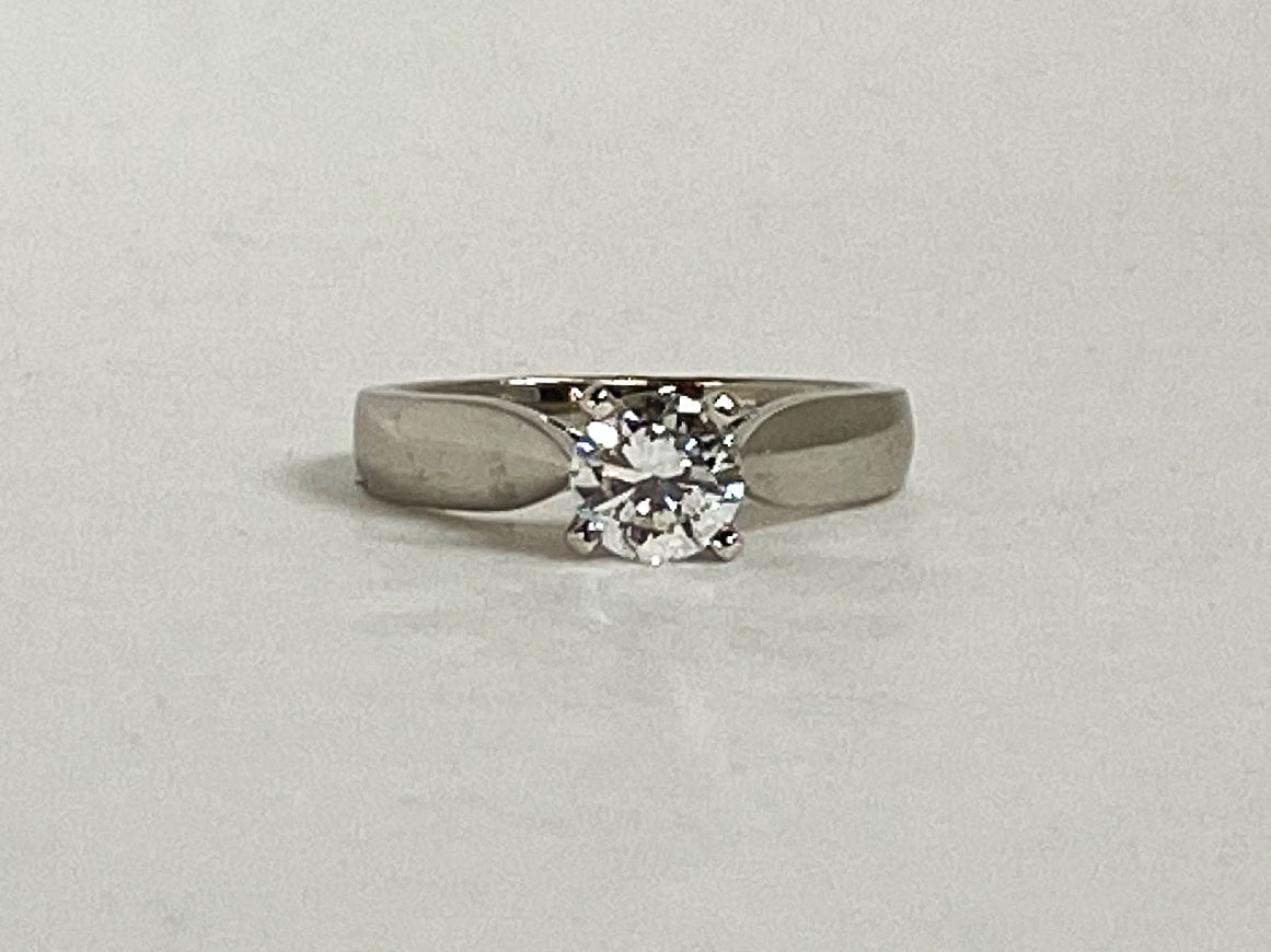 14K WG
.72 ct
Clarity I1
Colour E 
